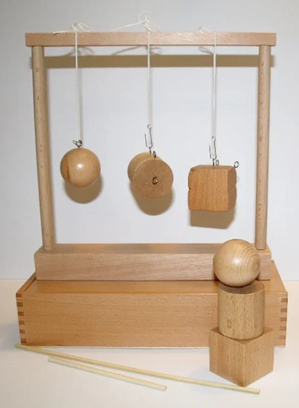 Froebel Gabe No. 2 – Sphere, Cylinder and Cube.