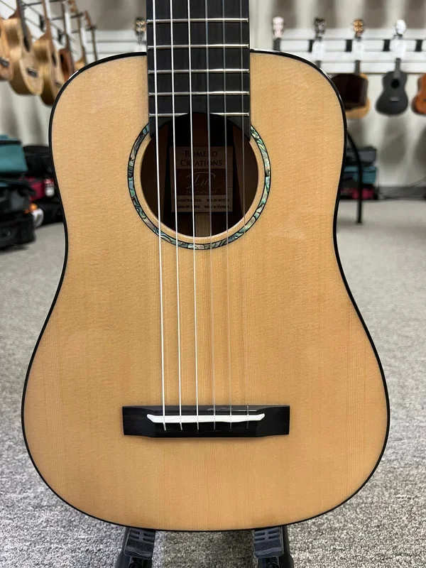 Romero Creations Daniel Ho 6 String Solid Spruce/Phoenix Dreadnought Nylon String Baritone Ukulele/Guitar w/Case – RC-DH6D-SP